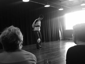 Photo of Amy Chartrand performing mask